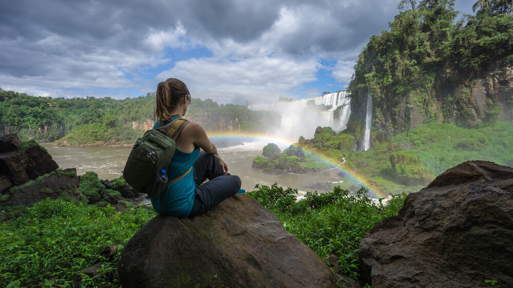 Gazing out over iguazufalls with a rainbow