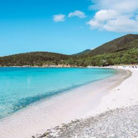 Bright blue, clear water against white sand at Salt Pond Beach in St John